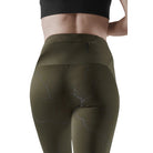 Women's CEP Reflective Tights. Green. Rear view.