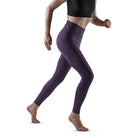 Women's CEP Reflective Tights. Purple. Lateral view.