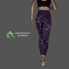 Women's CEP Reflective Tights. Purple. Rear view.
