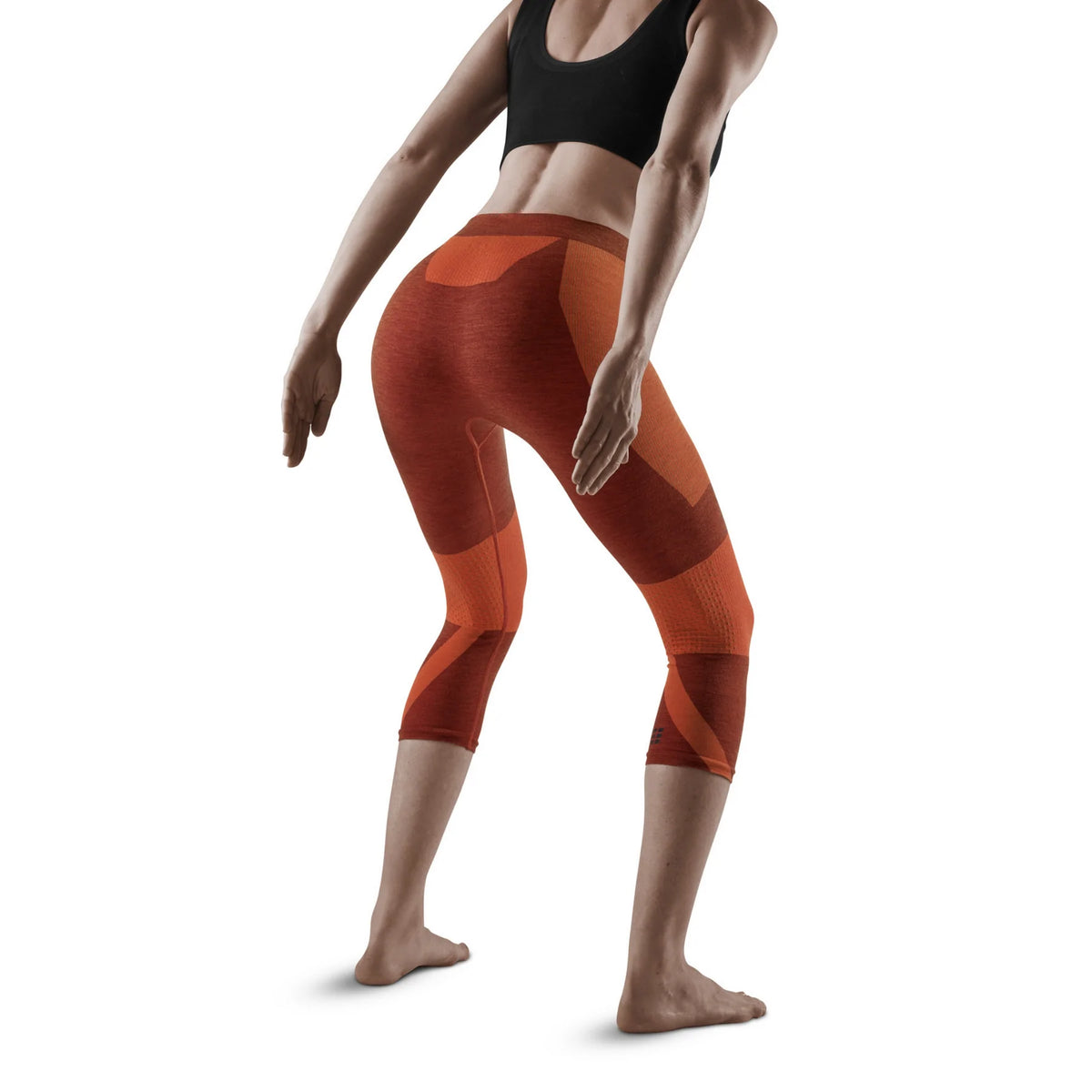 Women's CEP Ski Tights. Dark Orange. Rear/Lateral view.