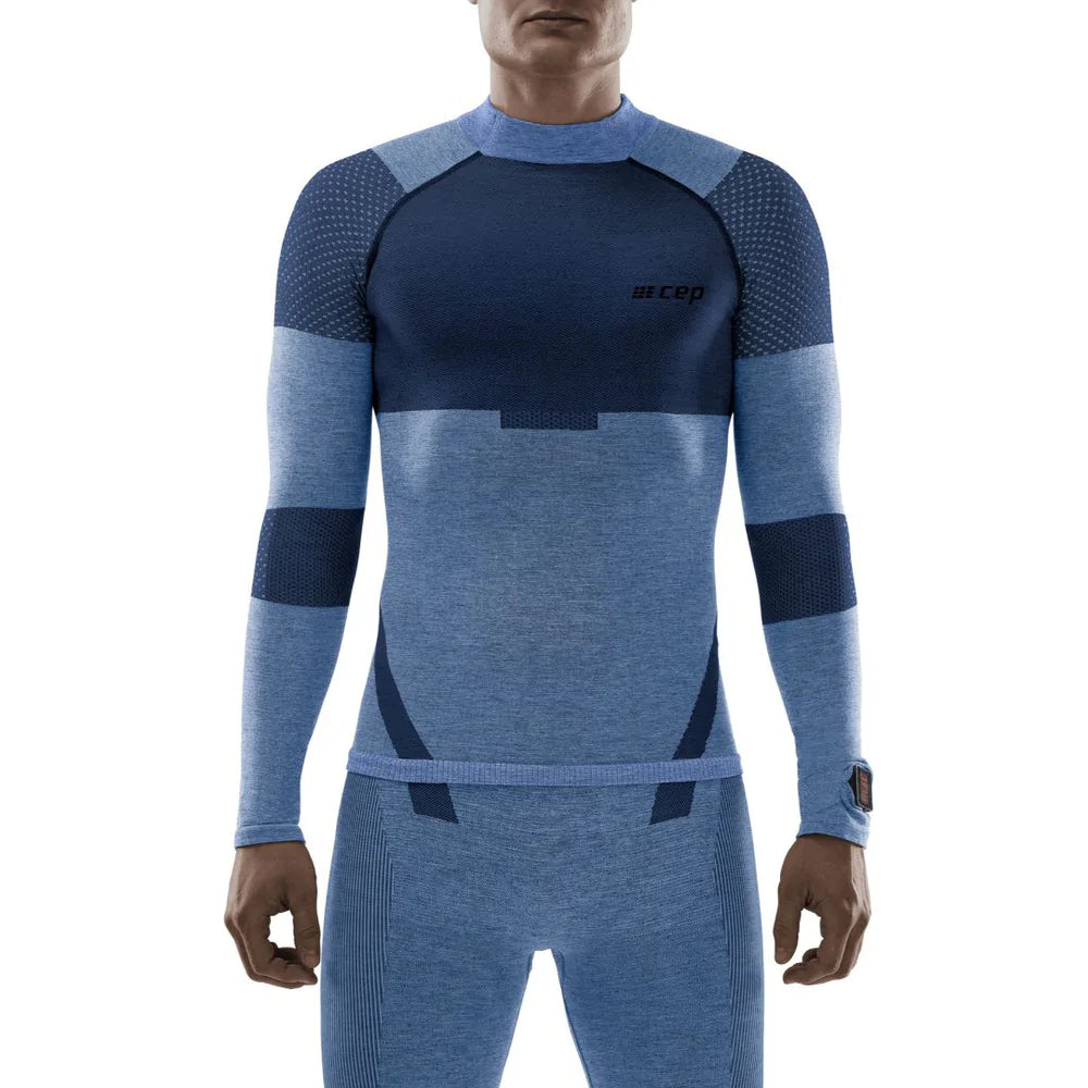 Men's CEP Ski Touring Base Shirt. Blue. Front view.