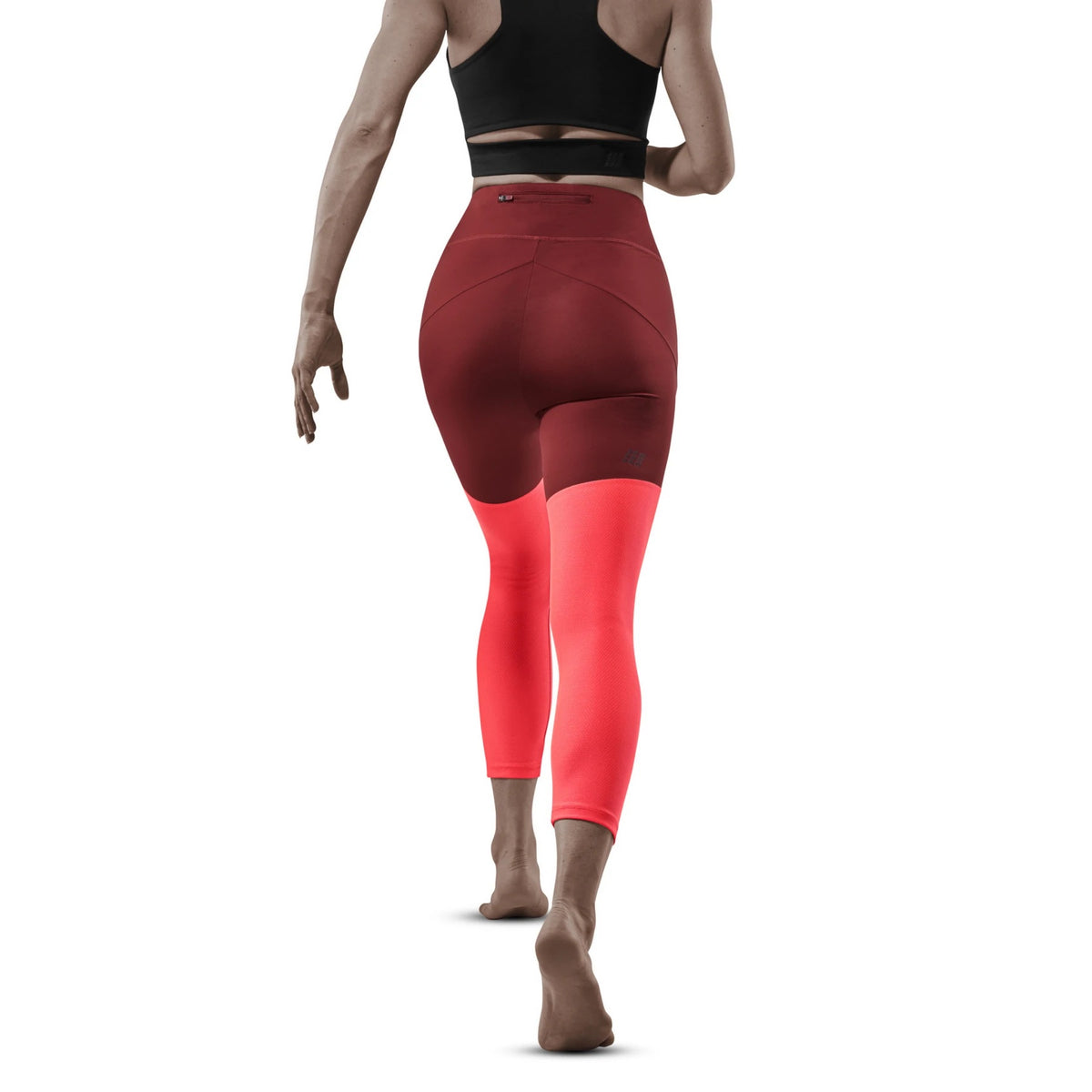 Women's CEP Ultralight 7/8 Tights. Red/Pink. Rear view.