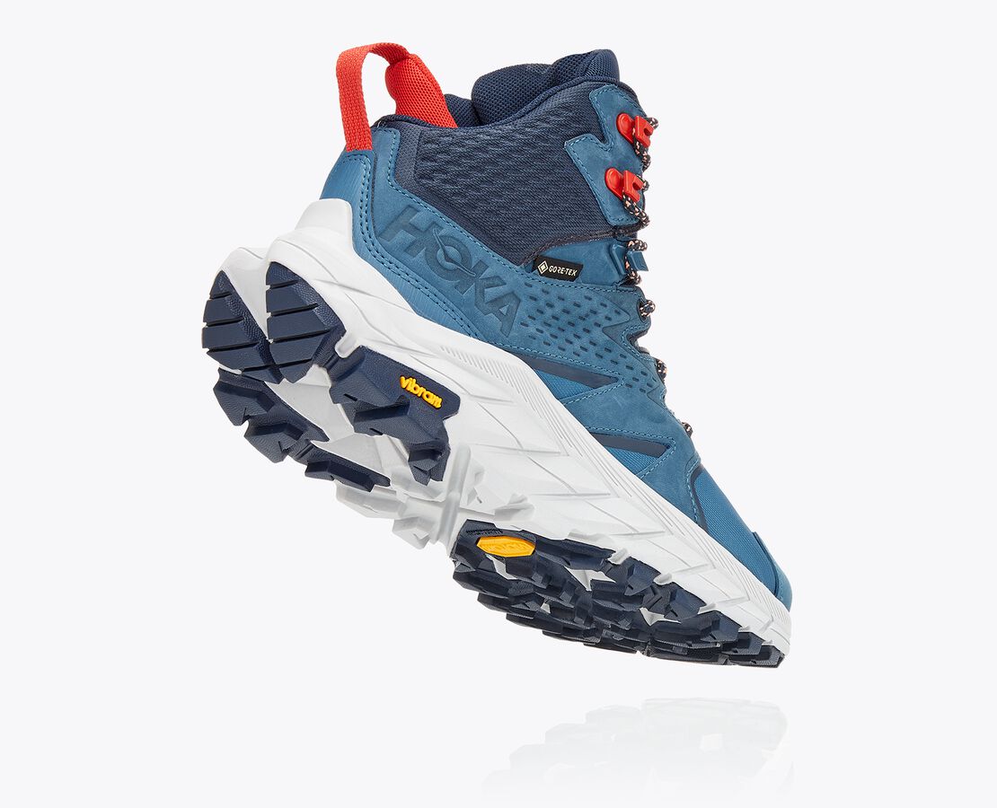 Women's Hoka Anacapa Mid GTX. Blue upper. Grey midsole. Rear view.