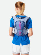 Women's Nathan Vapor Airess 3.0 7 Liter Hydration Vest. Light Blue. Rear view.