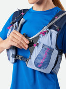 Women's Nathan Vapor Airess 3.0 7 Liter Hydration Vest. Light Blue. Front view.
