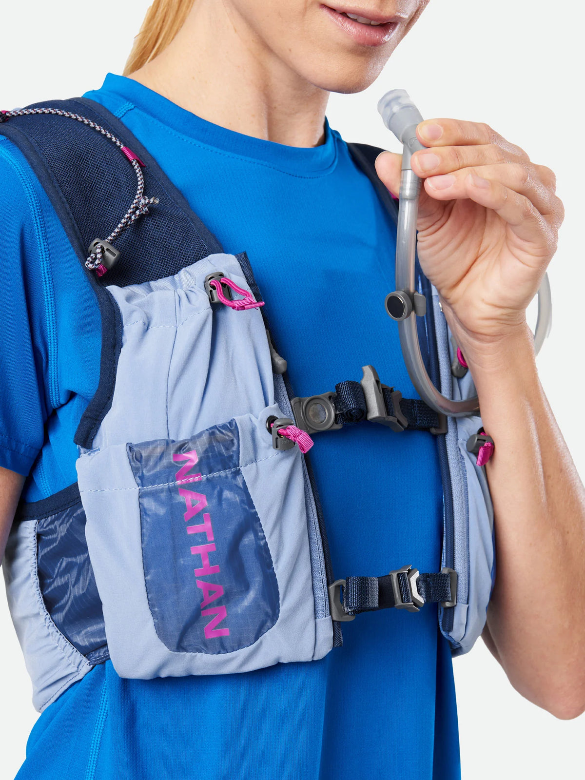 Women's Nathan Vapor Airess 3.0 7 Liter Hydration Vest. Light Blue. Front view.