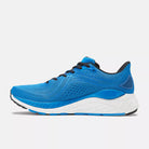 Men's New Balance 860v13. Blue upper. White midsole. Medial view.