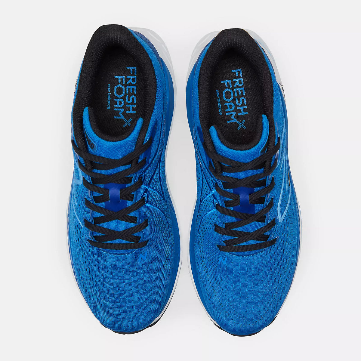 Men's New Balance 860v13. Blue upper. White midsole. Top view.