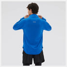 Men's New Balance Heat Grid Half-Zip. Blue. Rear view.