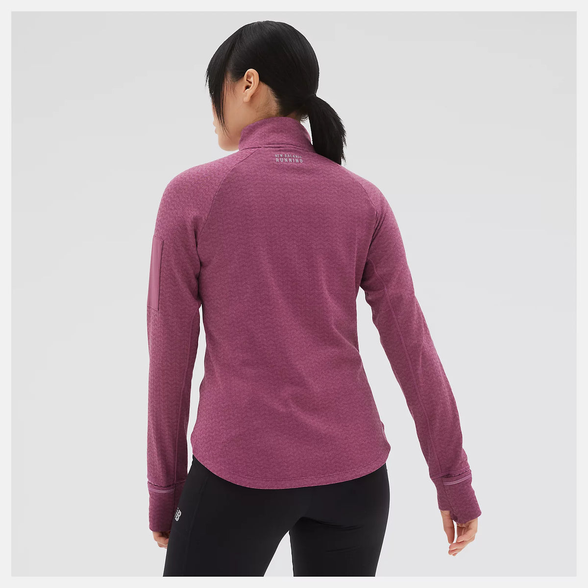 Men's New Balance Heat Grid Half-Zip. Dark Pink. Rear view.
