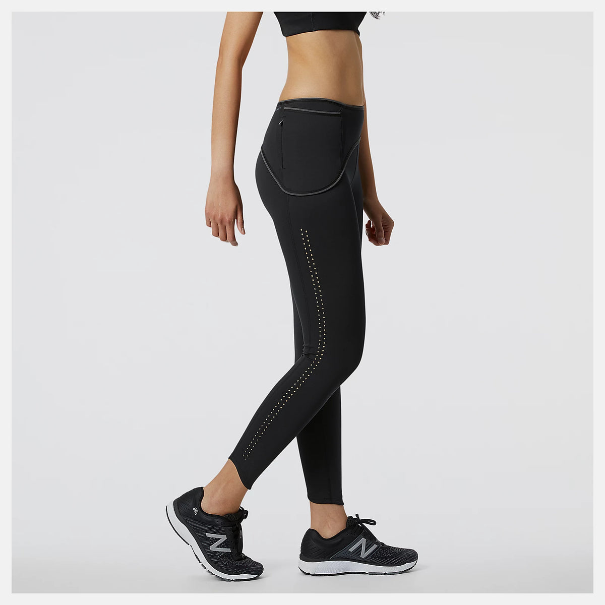 Women's New Balance PMV Kimbia Tights. Black. Lateral view.
