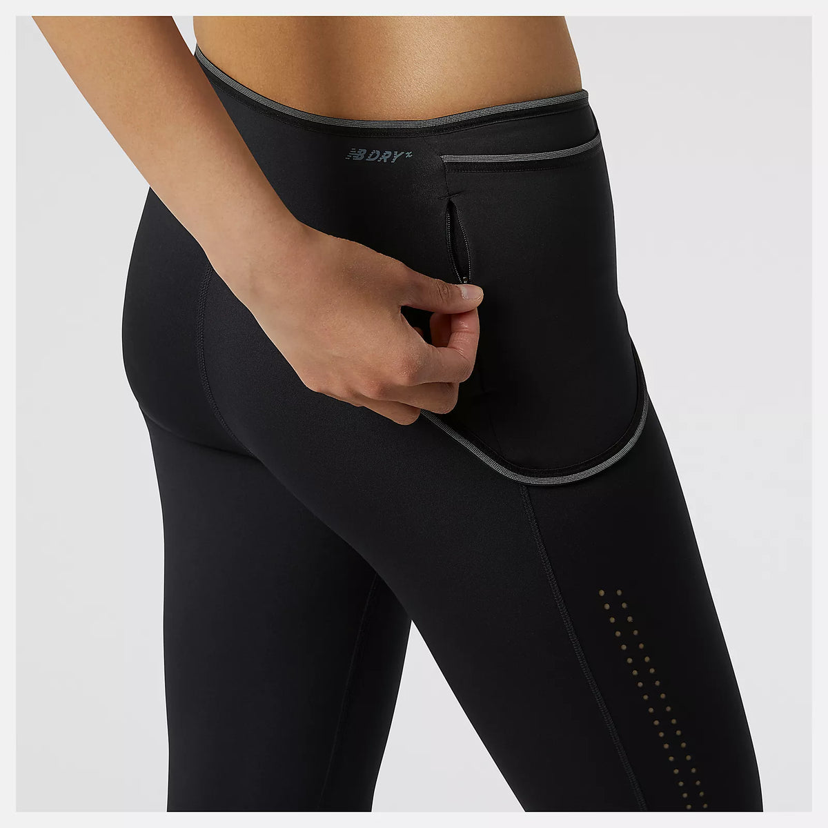 Women's New Balance PMV Kimbia Tights. Black. Rear view.