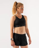 Women's rabbit Sports Bra. Black. Front view.