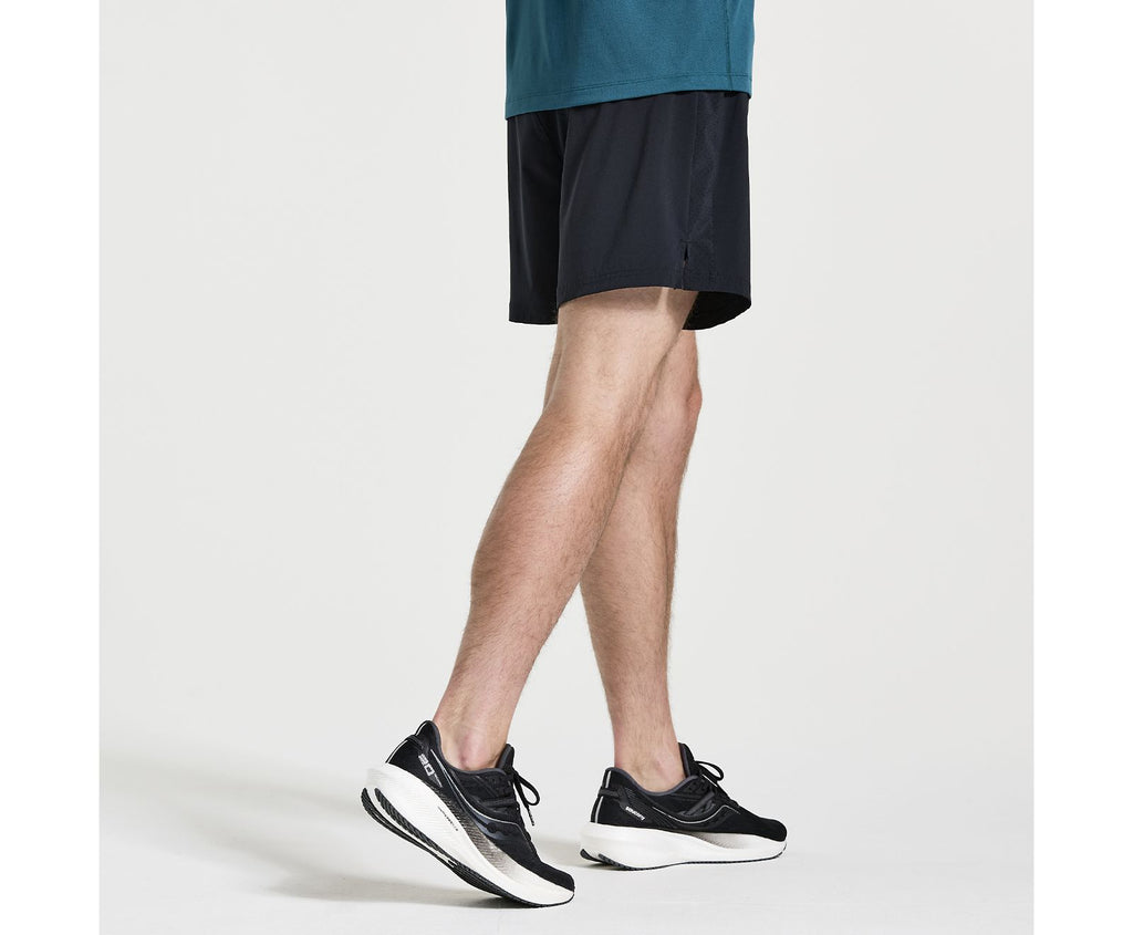 Men's Saucony Outpace Shorts. Black. Lateral view.