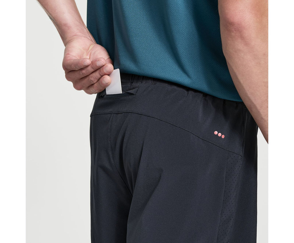 Men's Saucony Outpace Shorts. Black. Rear pocket closeup.