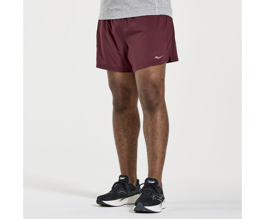 Men's Saucony Outpace Shorts. Red/Grey. Front view.