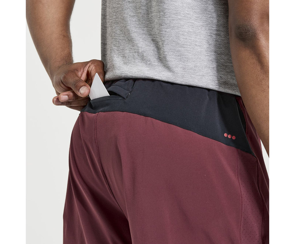 Men's Saucony Outpace Shorts. Red/Grey. Rear pocket closeup.