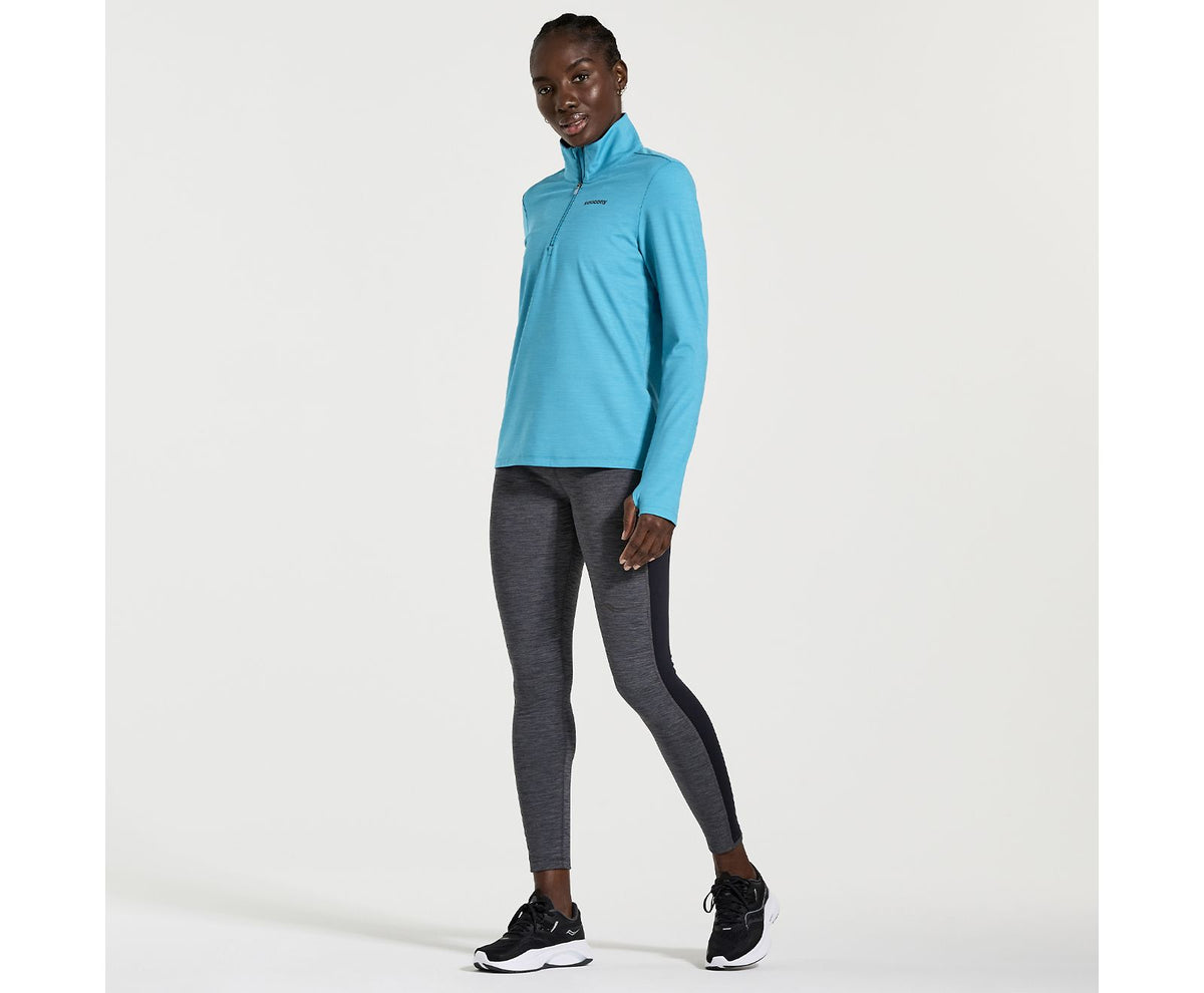 Women's Saucony Solstice 1/4 zip. Blue. Front view.