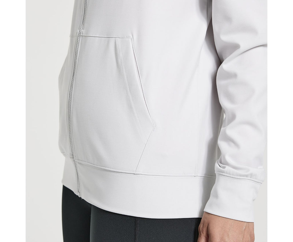 Women's Saucony Solstice Zip Hoodie. White. Pocket closeup.